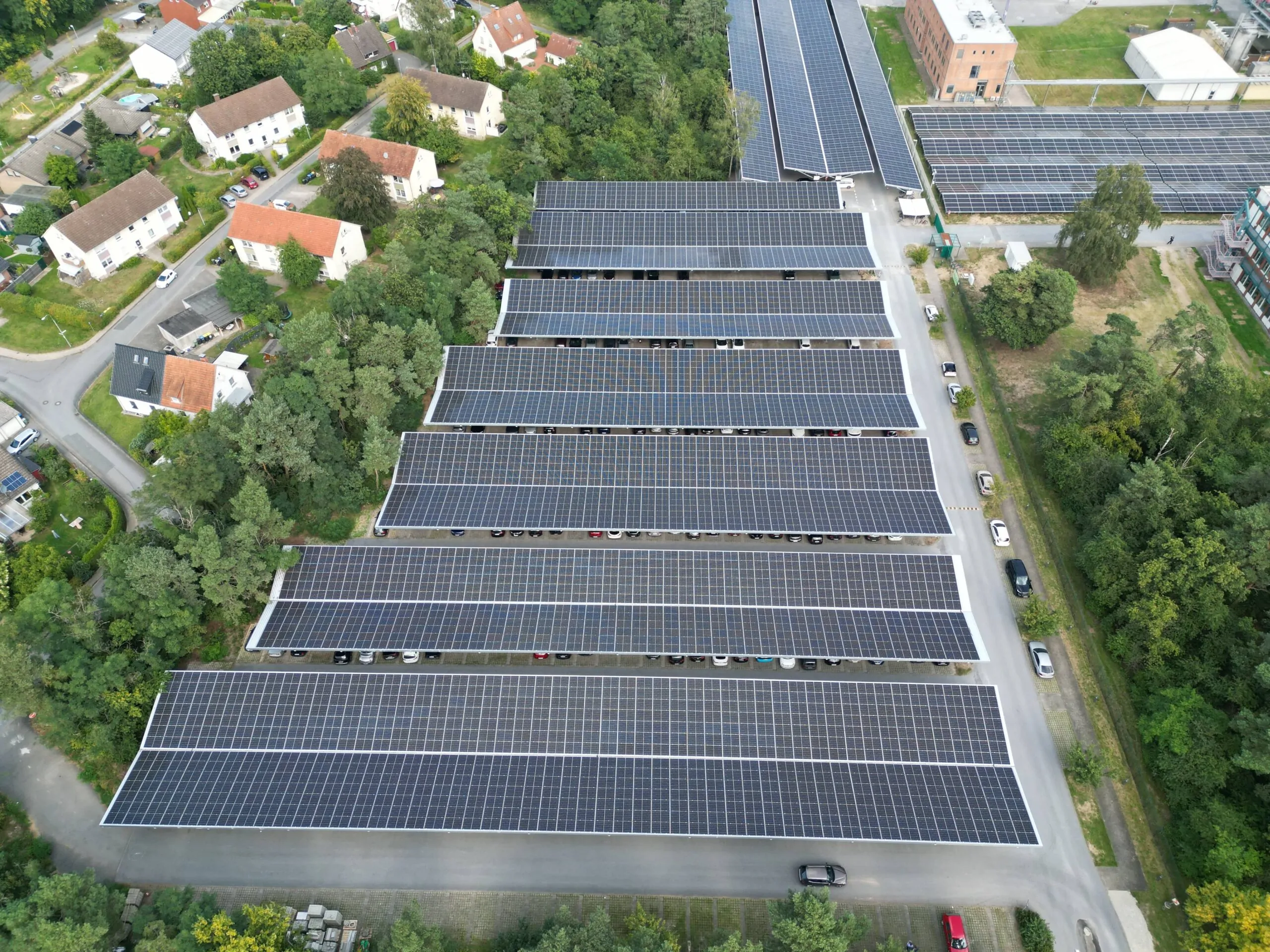 Baxter-Halle-1 Aerial view of Bion XL solar parking canopies at Baxter Halle, Germany